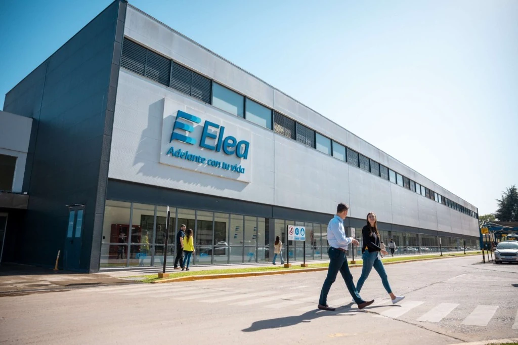 Elea headquarters building facade with staff walking at the entrance